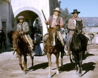 Christopher Mitchum, John Wayne and Patrick Wayne / Big Jake / 1971 directed by George Sherman [Cinema General Pictures / Batjac]